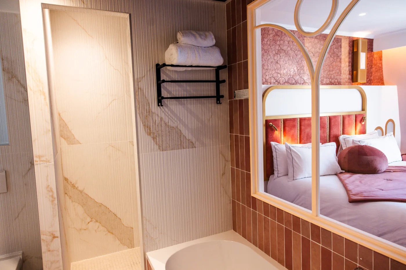 Prestige bathroom - shower, bathtub and marble sink, gilded Art Deco mirror
